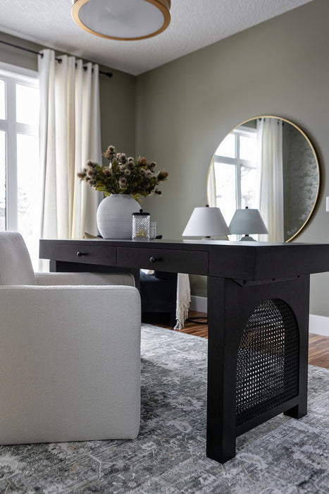black washed mango desk with cane inlay legs and blackwashed hardware with two drawers monochromatic desk shopkoehndesign calgsary furniture shop amy koehn calgary designer