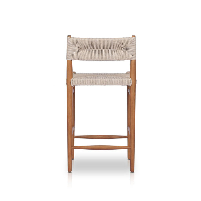 slim, tapered teak frames this woven all-weather wicker counter stool shopkoehndesign interior design calgary furniture shop amy koehn calgary designer