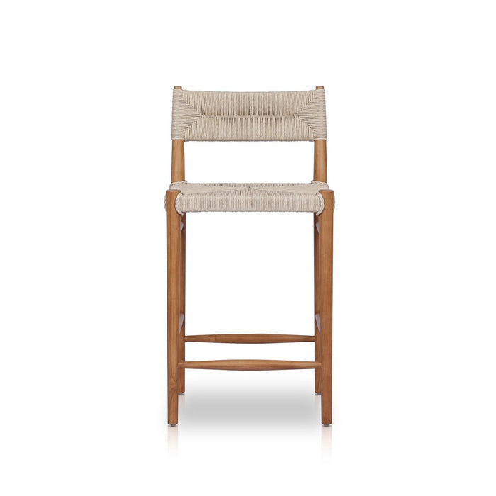 slim, tapered teak frames this woven all-weather wicker counter stool shopkoehndesign interior design calgary furniture shop amy koehn calgary designer