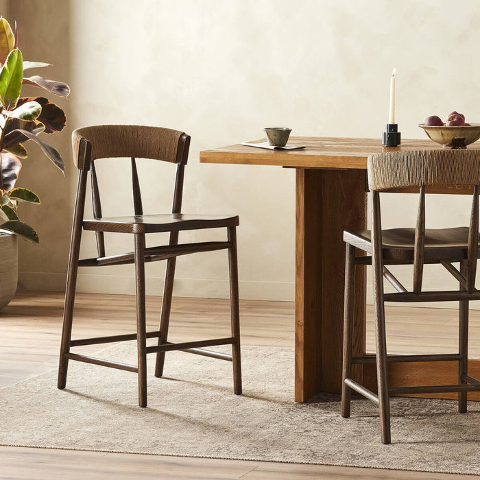 solid oak stool with tapered legs and a paper rush wrapped back rest sculpted seat counter stool shopkoehndesign calgary furnitue shop amy koehn calgary designer