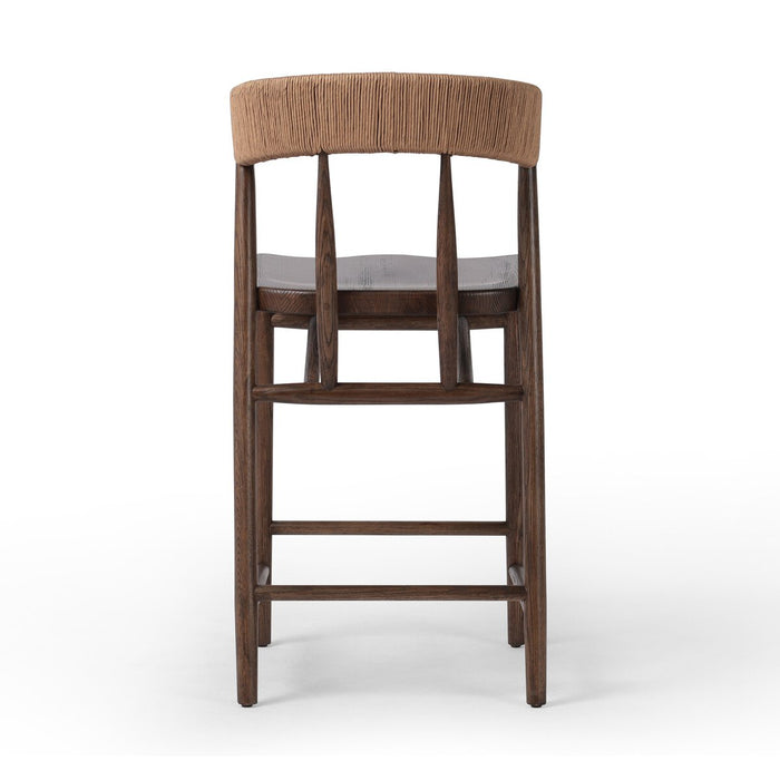 solid oak stool with tapered legs and a paper rush wrapped back rest sculpted seat counter stool shopkoehndesign calgary furnitue shop amy koehn calgary designer