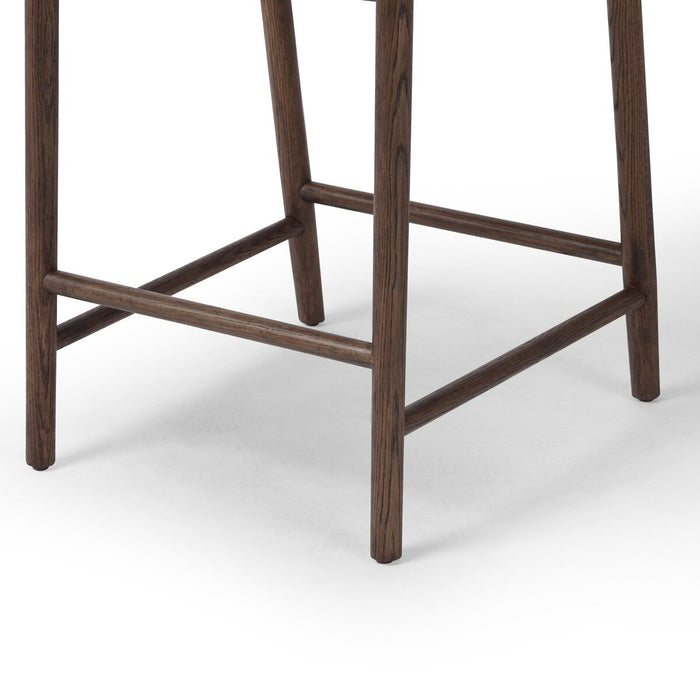 solid oak stool with tapered legs and a paper rush wrapped back rest sculpted seat counter stool shopkoehndesign calgary furnitue shop amy koehn calgary designer