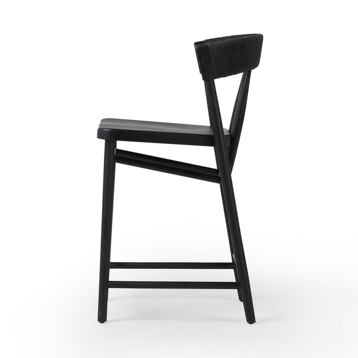 solid oak stool with tapered legs and angled seat and rattan wrapped paper rush back rest in black solid oak shopkoehndesign calgary furniture shop amy koehn calgary designer