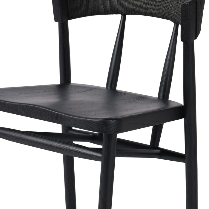 solid oak stool with tapered legs and angled seat and rattan wrapped paper rush back rest in black solid oak shopkoehndesign calgary furniture shop amy koehn calgary designer