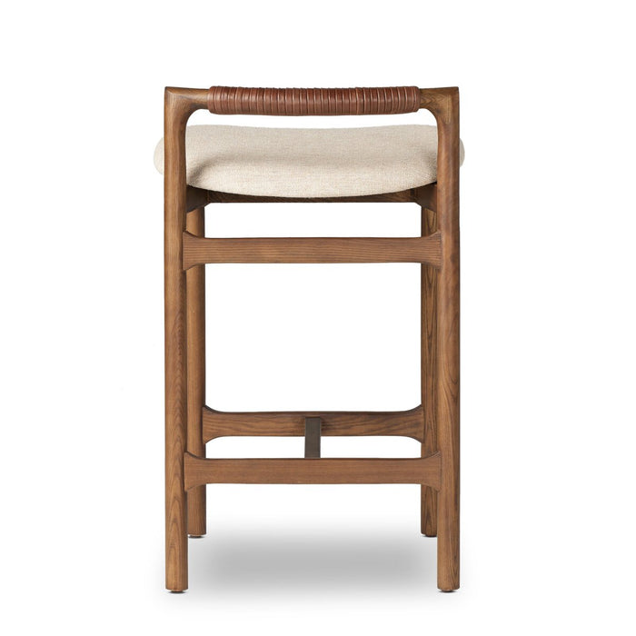 minimalist frame with low back leather wrapped linen blend cushion counter stool amy koehn calgary desginer shopkoehndesign calgary furniture shop