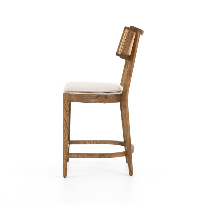 warm wood stool with inlay of natural cane and linen blend cushions modern  counter stool shopkoehndesign interior design calgary amy koehn calgary furniture shop