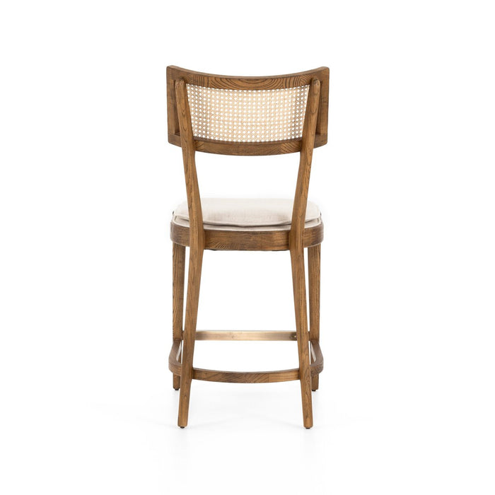 warm wood stool with inlay of natural cane and linen blend cushions modern  counter stool shopkoehndesign interior design calgary amy koehn calgary furniture shop