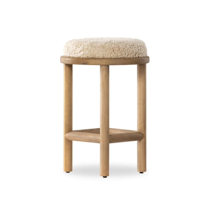 solid parawood round stool with soft beige shearling cushion armless and backless counter stool shopkoehndesign calgary furniture shop amy koehn calgary designer