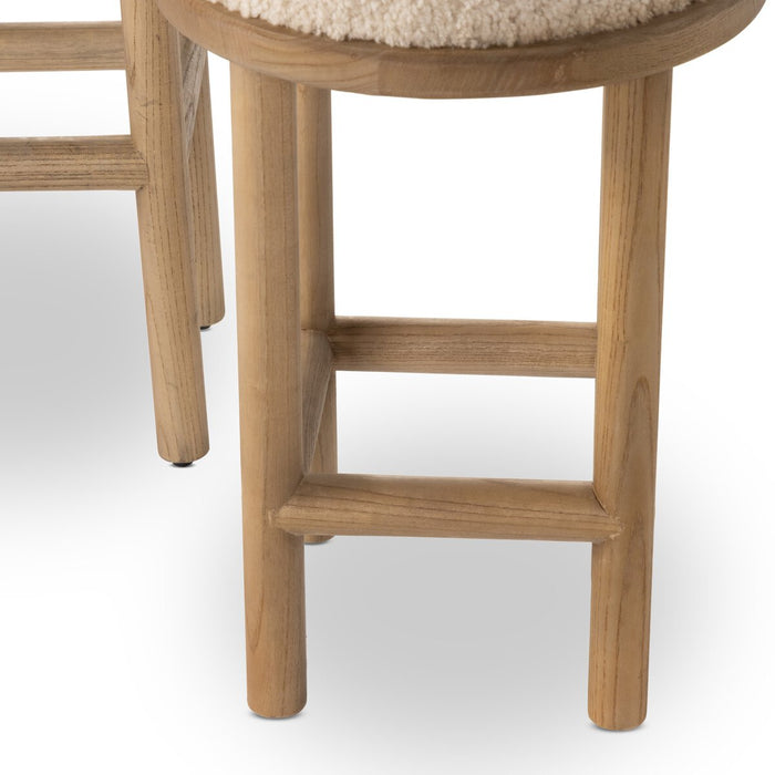 solid parawood round stool with soft beige shearling cushion armless and backless counter stool shopkoehndesign calgary furniture shop amy koehn calgary designer