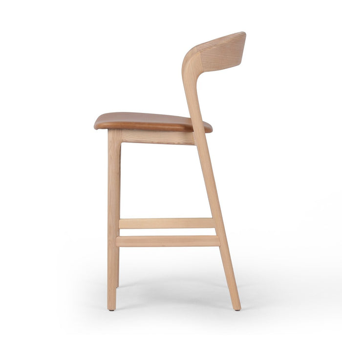 simple Scandinavian styling, solid ash with camel top leather grain seat counter stool amy koehn koehndesign shopkoehndesign calgary designer calgary furniture shop