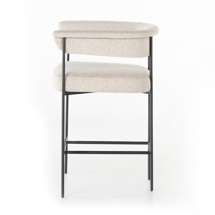 slim, black-finished iron framing, camel-colored upholstery counter stool shopkoehndesign interior design calgary designer calgary furniture shop online