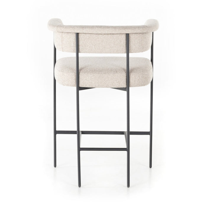 slim, black-finished iron framing, camel-colored upholstery counter stool shopkoehndesign interior design calgary designer calgary furniture shop online