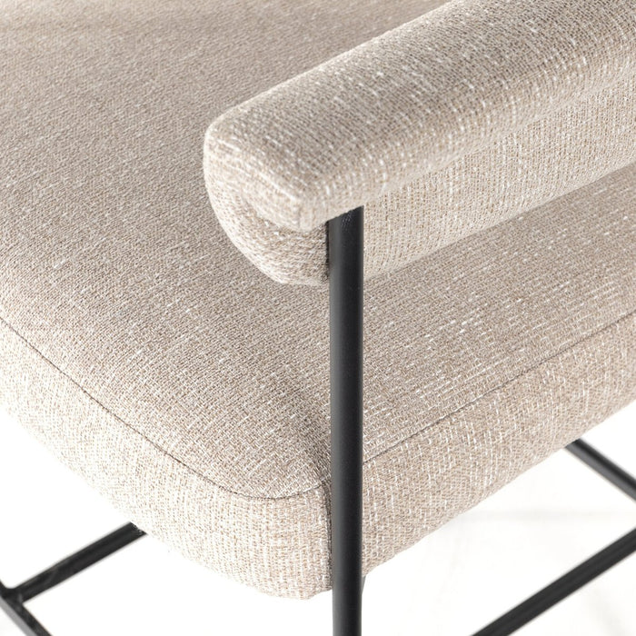 slim, black-finished iron framing, camel-colored upholstery counter stool shopkoehndesign interior design calgary designer calgary furniture shop online