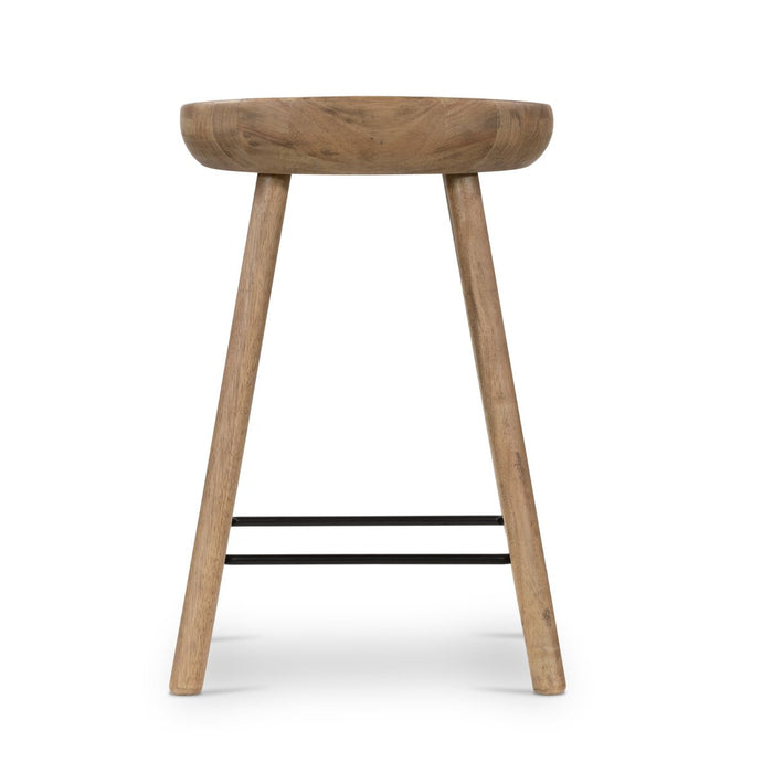 armless and backless sculpted seat parawood with black metal footrest natural solid wood stool shopkoehndesign calgary furniture shop amy koehn calgary designer