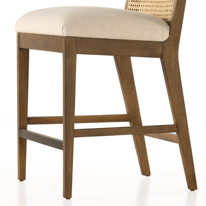 wood frame armless cane inlay linen blend cushion counter stool shopkohendesign calgary furniture shop amy koehn calgary designer