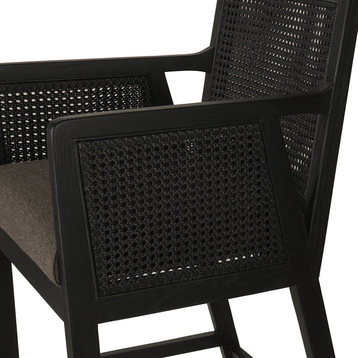 Ebony finished nettlewood frames a textural inlay of dark cane arms and back with top grain dark leather seat with brass kickplate counter stool shopkoehndesign calgary furniture shop amy koehn calgary designer