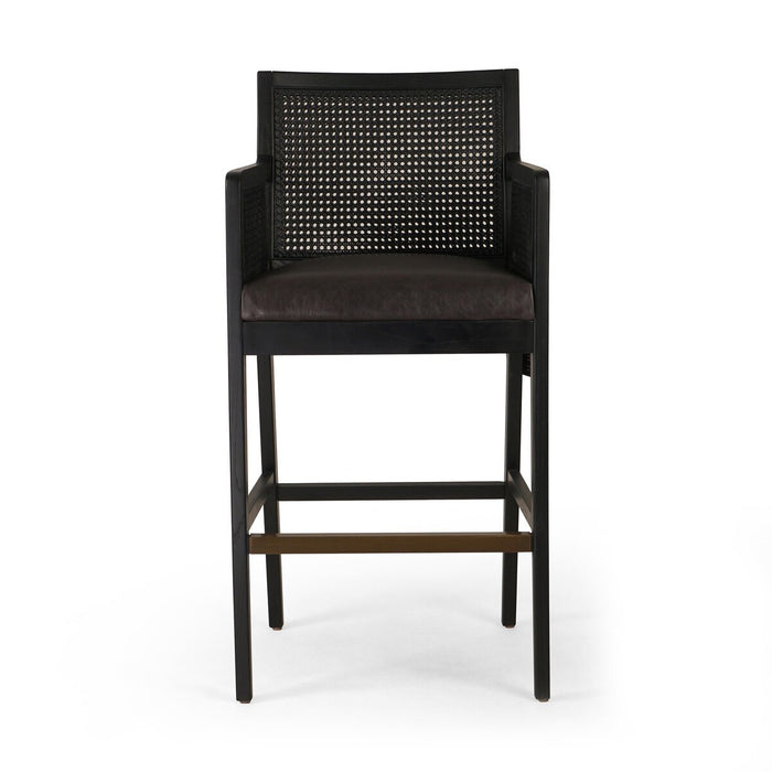 Ebony finished nettlewood frames a textural inlay of dark cane arms and back with top grain dark leather seat  counter stool shopkoehndesign calgary furniture shop amy koehn calgary designer