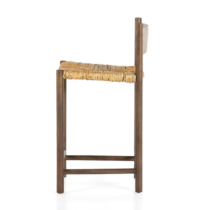 solid mango forms a clean, angular frame for a woven banana leaf seat counter stool shopkoehndesign calgary furniture shop amy koehn calgary designer