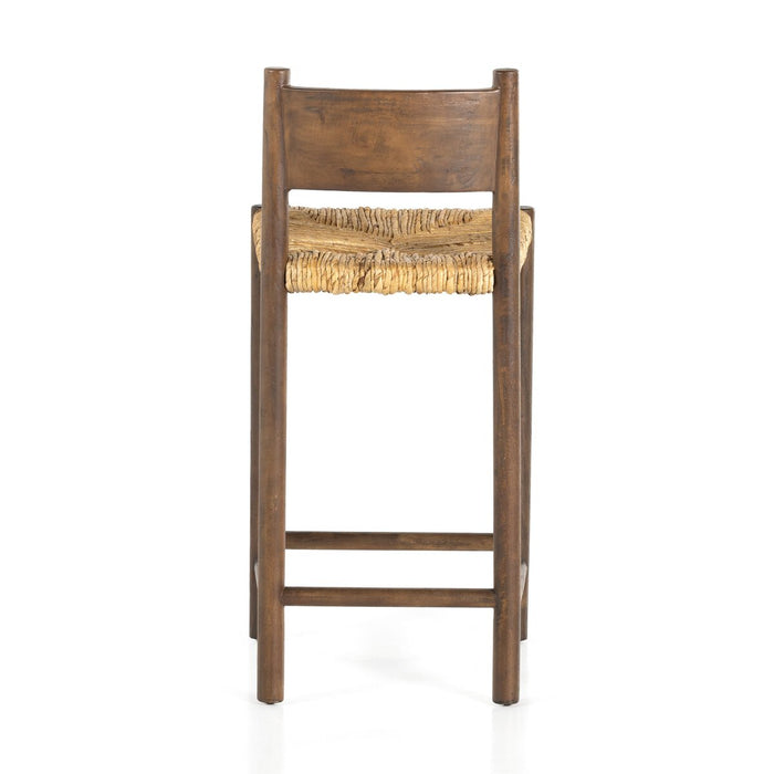 solid mango forms a clean, angular frame for a woven banana leaf seat counter stool shopkoehndesign calgary furniture shop amy koehn calgary designer
