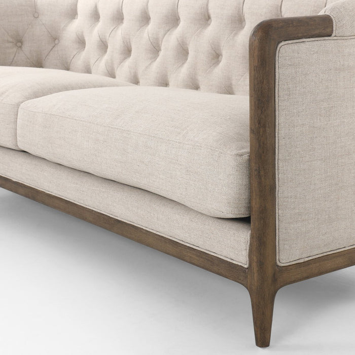 cream linen tradiontal button tufted linen performance fabric wood frame rolled arms parisian cream sofa amy koehn calgary designer calgary furniture shop