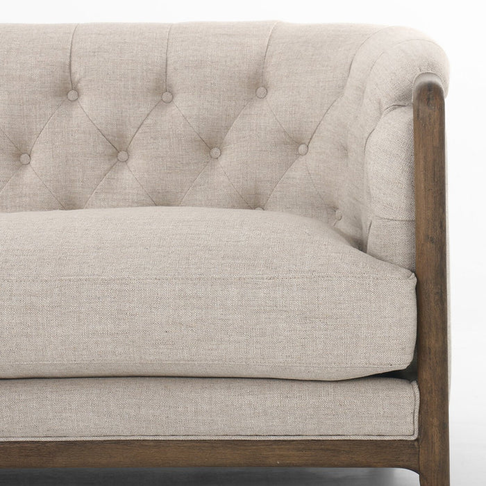 cream linen tradiontal button tufted linen performance fabric wood frame rolled arms parisian cream sofa amy koehn calgary designer calgary furniture shop