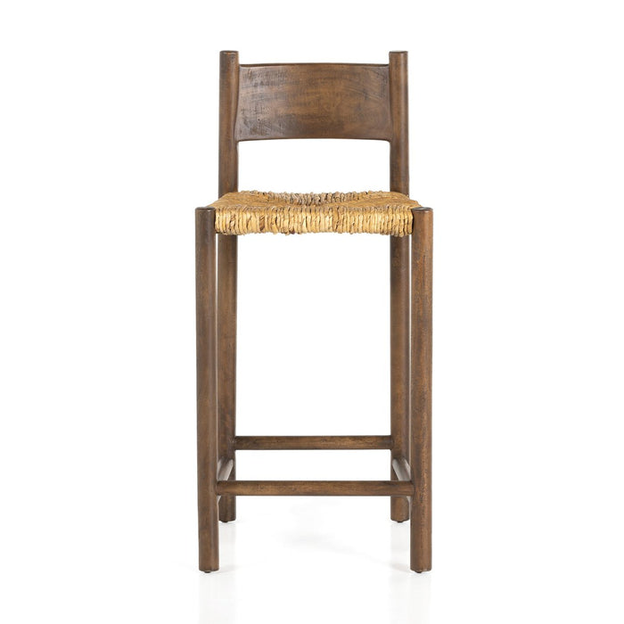 solid mango forms a clean, angular frame for a woven banana leaf seat counter stool shopkoehndesign calgary furniture shop amy koehn calgary designer