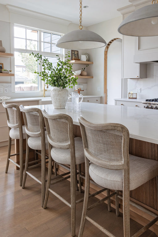natural oak with cane inlay back and cream linen blend seat counter stool shopkoehndesign interior design calgary online furniture shop amy koehn