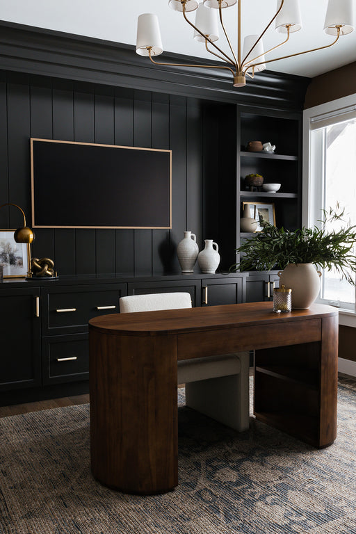 Finished in a rich caramel brown, acacia forms a pill-inspired shape to nod Eighties-era design. Half-cylinder bases feature open interior shelving, with two top pencil drawers to keep supplies handy desk shopkoehndesign calgayr furniture shop amy koehn calgry designer