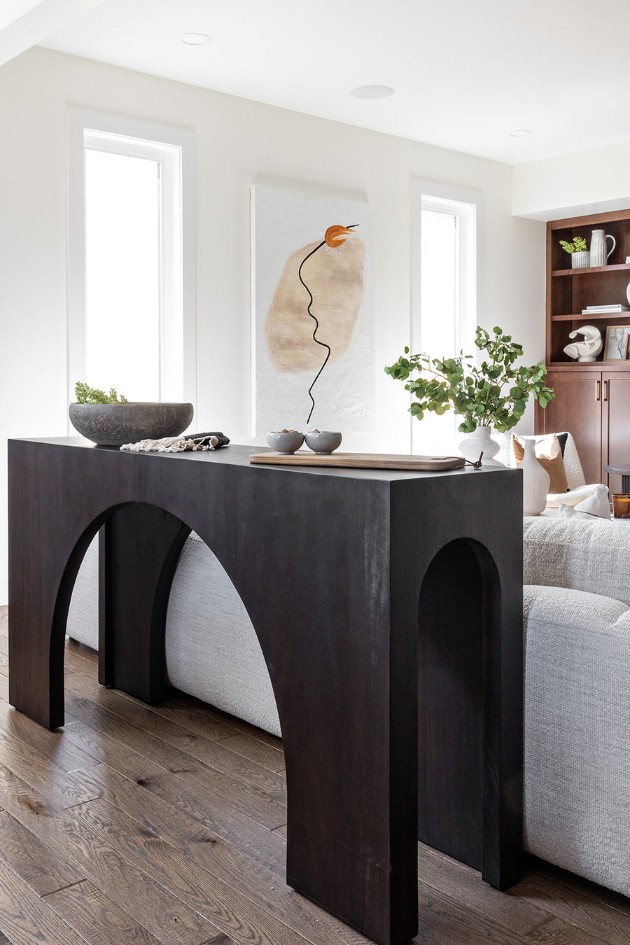 console table  interior design  koehndesign  calgary designer  amy kohen  calgary  yyclifestyle  yycliving  calgary furniture  calgary furniture shop  shopkoehndesign  accent table  angled corners  angular frame  canada  clean lines  drink table  elegant  furniture  Luxury Furniture  mid century design  mid-century  minimalist  minimalist design  modern accent table  modern  online furniture shop  round edge  wood base  wood frame  wood grain  smoked guanacaste  dark wood table  arched detail  Modern Design