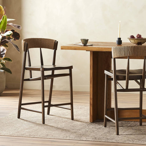 solid oak stool with tapered legs and a paper rush wrapped back rest sculpted seat counter stool shopkoehndesign calgary furnitue shop amy koehn calgary designer