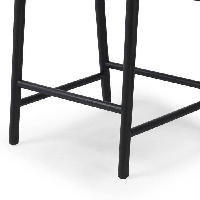 solid oak stool with tapered legs and angled seat and rattan wrapped paper rush back rest in black solid oak shopkoehndesign calgary furniture shop amy koehn calgary designer 