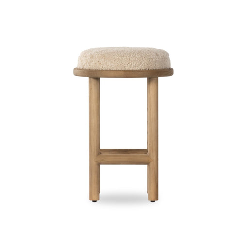 solid parawood round stool with soft beige shearling cushion armless and backless counter stool shopkoehndesign calgary furniture shop amy koehn calgary designer