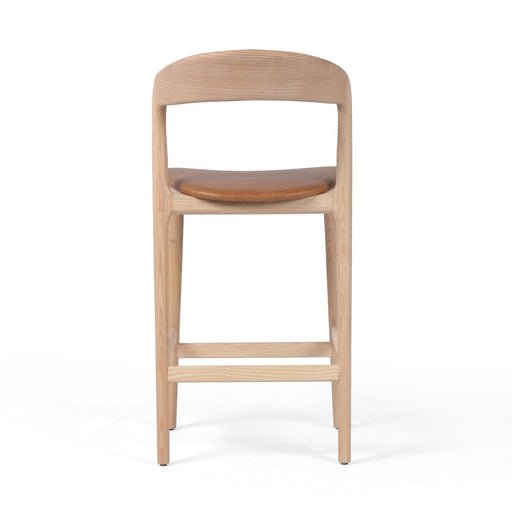 simple Scandinavian styling, solid ash with camel top leather grain seat counter stool amy koehn koehndesign shopkoehndesign calgary designer calgary furniture shop