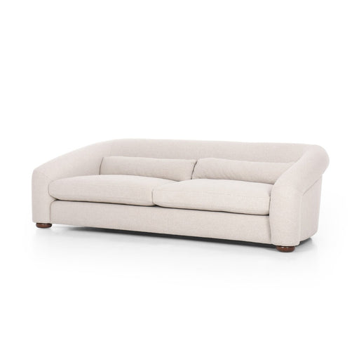 loose feather blend traditional shaped cream ivory sofa with rolled arms  and performance fabric amy koehn koehndesign calgary designer calgary furniture shop  