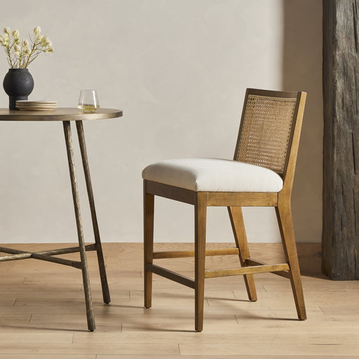 wood frame armless cane inlay linen blend cushion counter stool shopkohendesign calgary furniture shop amy koehn calgary designer