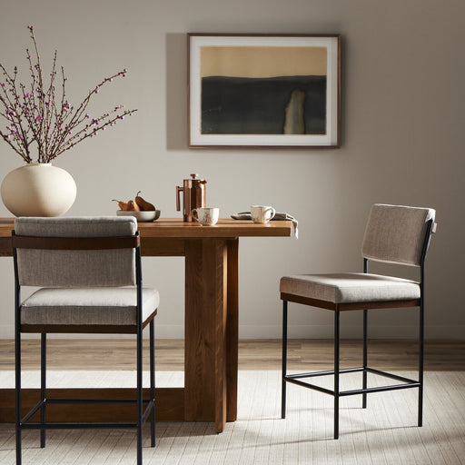 simple black-finished round stock iron linen blend seat counter stool amy koehn koehndesign calgary designer calgary furniture shop 