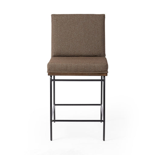 Slim, black-finished iron frames a floating ladderback of solid oak boucle brow fabric cushion counter stool amy koehn calgary designer shopkohen design calgary furniture shop 